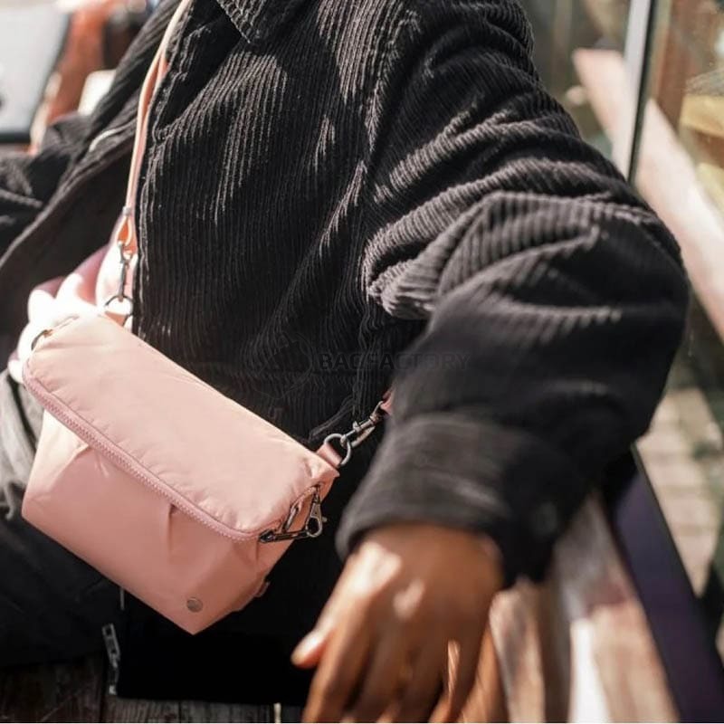 Жіноча сумка антизлодій Pacsafe Citysafe CX Convertible Crossbody 5L 6 ст. захисту Рожева (20405340)