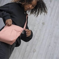 Жіноча сумка антизлодій Pacsafe Citysafe CX Convertible Crossbody 5L 6 ст. захисту Рожева (20405340)