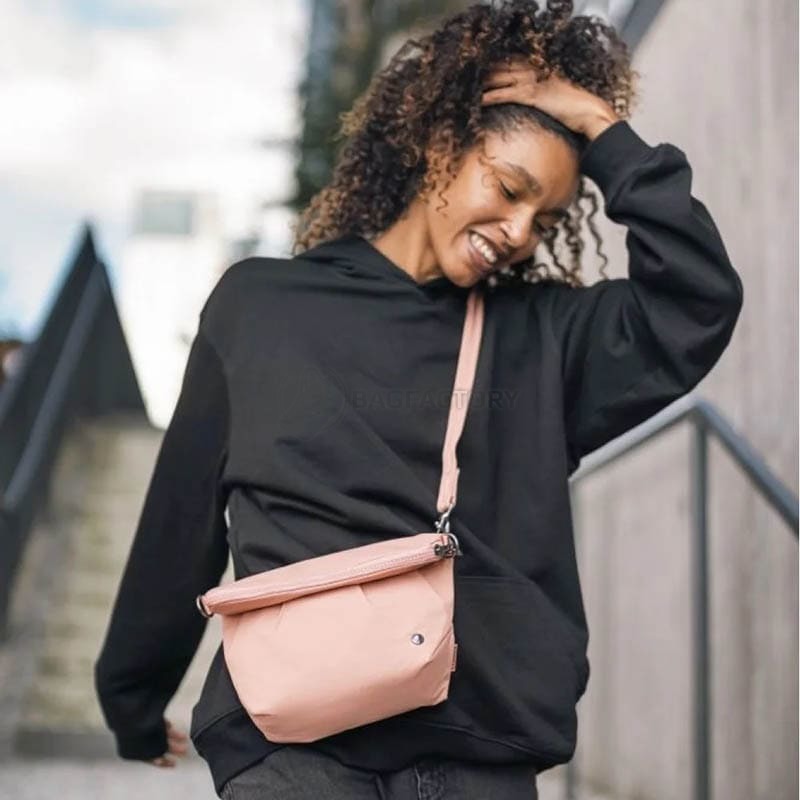 Жіноча сумка антизлодій Pacsafe Citysafe CX Convertible Crossbody 5L 6 ст. захисту Рожева (20405340)