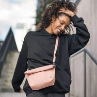 Жіноча сумка антизлодій Pacsafe Citysafe CX Convertible Crossbody 5L 6 ст. захисту Рожева (20405340)